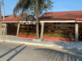 Ampla casa em condomínio a 300mt da praia